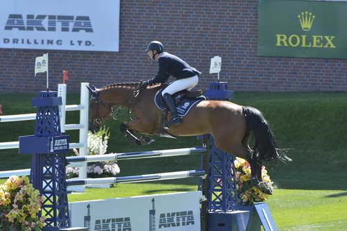 Spruce-Meadows-9-4-13-6023-PieterDevos-EquipharmaDaxVanDabdijhoeve-BEL-DDeRosaPhoto