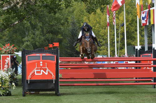 Spruce-Meadows-9-8-13-3581-PieterDevos-Candy-BEL-DDeRosaPhoto