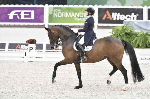 WEG-Dressage-8-25-14-GPTeam-0004666-JeannaHogberg-DarciaVH-SWE-DDeRosaPhoto