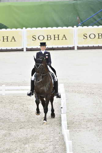 WEG-Dressage-8-25-14-GPTeam-0003889-TinaKonyot-CalectoV-USA-DDeRosaPhoto