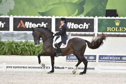 WEG-Dressage-8-25-14-GPTeam-0003916-TinaKonyot-CalectoV-USA-DDeRosaPhoto