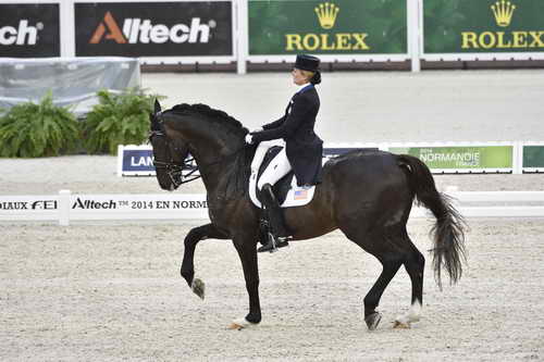 WEG-Dressage-8-25-14-GPTeam-0003985-TinaKonyot-CalectoV-USA-DDeRosaPhoto