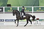 WEG-Dressage-8-25-14-GPTeam-0003936-TinaKonyot-CalectoV-USA-DDeRosaPhoto