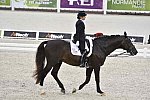 WEG-Dressage-8-25-14-GPTeam-0004011-TinaKonyot-CalectoV-USA-DDeRosaPhoto